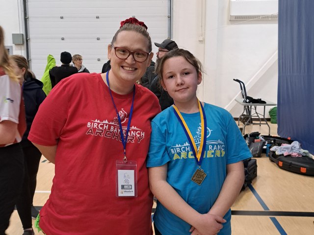 Coach and Gold Medalist (Student)